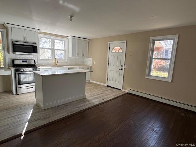 177 Riley Road New Windsor, NY 12553 - Photo 10 of 39 a kitchen with stainless steel appliances granite countertop a stove and a sink