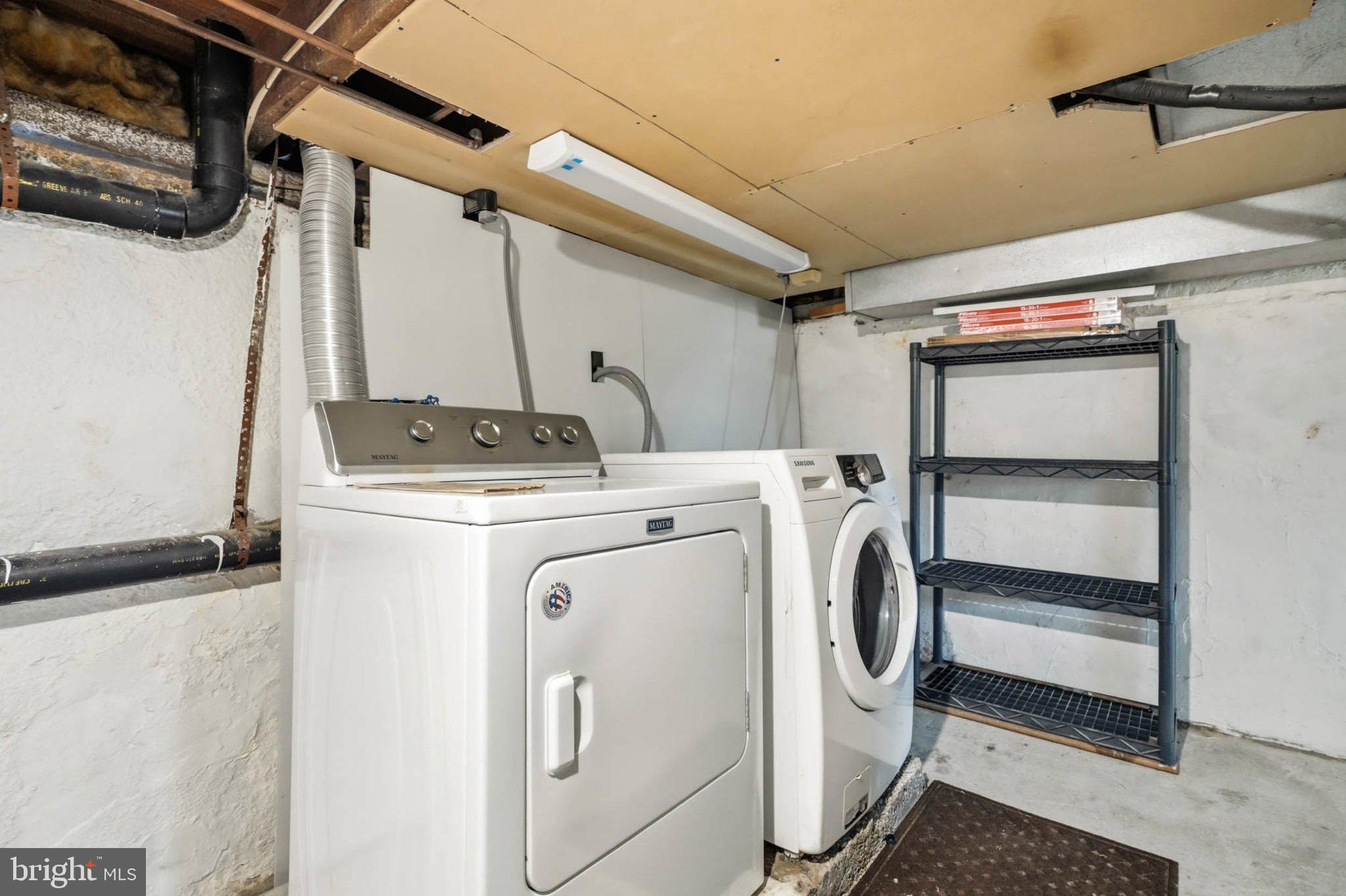 7322 Windsor Mill Road Windsor Mill, MD 21244 - Photo 28 of 34 Functional laundry space with storage.