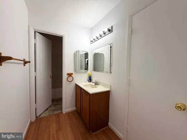 a bathroom with a toilet and a bathtub
