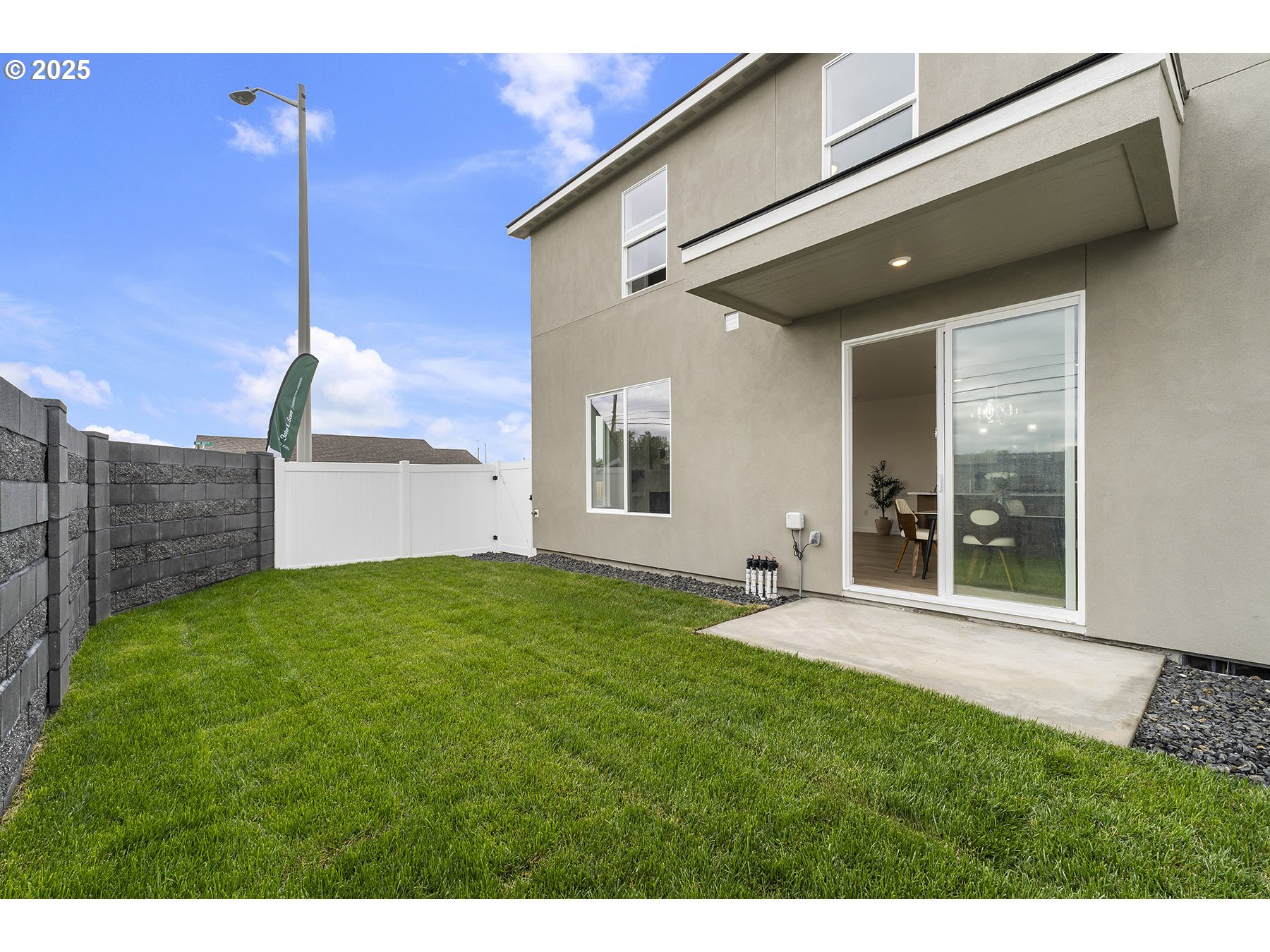 Northeast Emerald Drive Hermiston, OR 97838 - Photo 7 of 11 a view of a backyard with plants and a garden