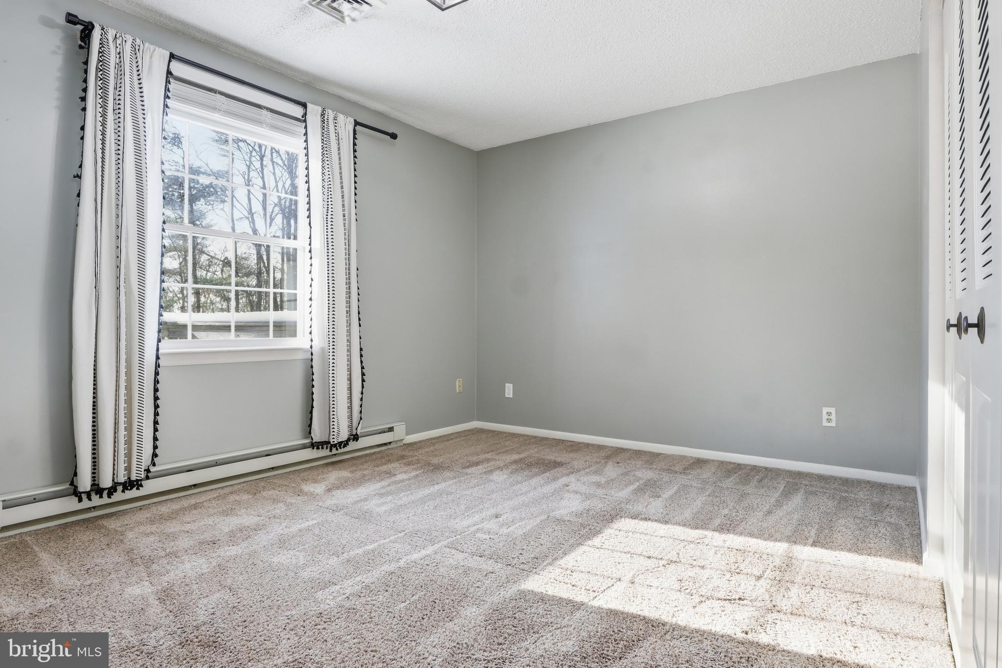 276 Oakbrook Drive Felton, PA 17322 - Photo 14 of 55 an empty room with windows