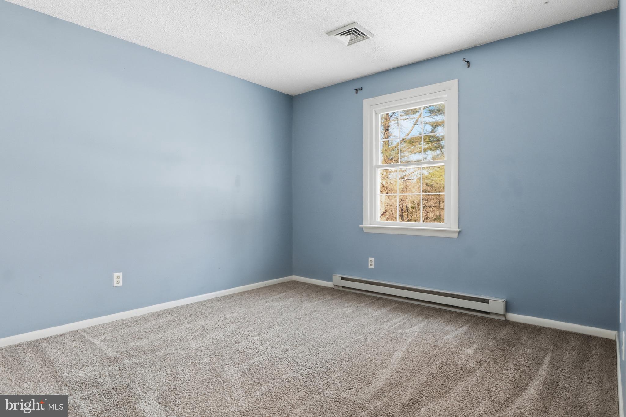 276 Oakbrook Drive Felton, PA 17322 - Photo 16 of 55 an empty room with windows