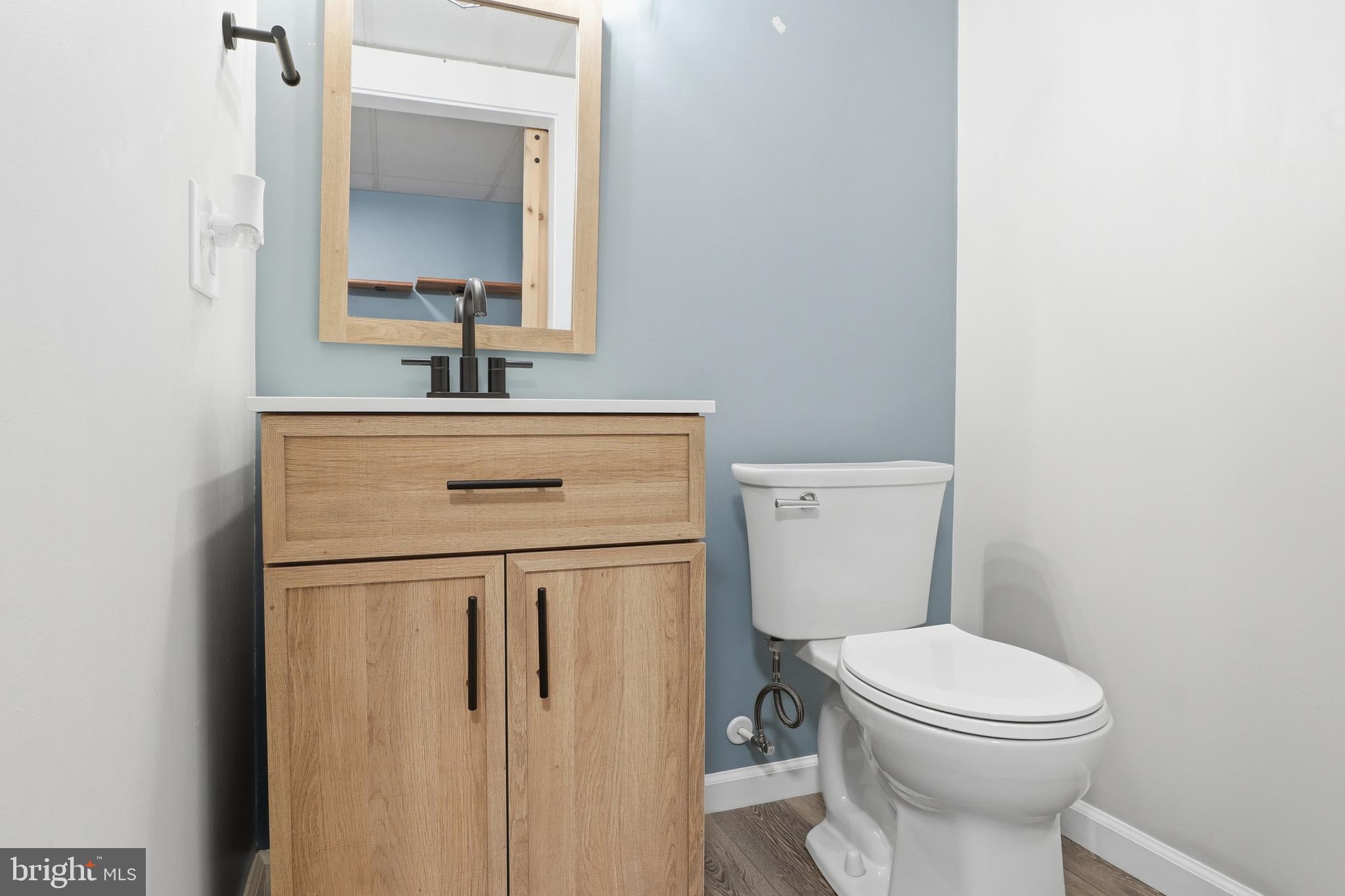 276 Oakbrook Drive Felton, PA 17322 - Photo 24 of 55 a bathroom with a toilet a sink and mirror