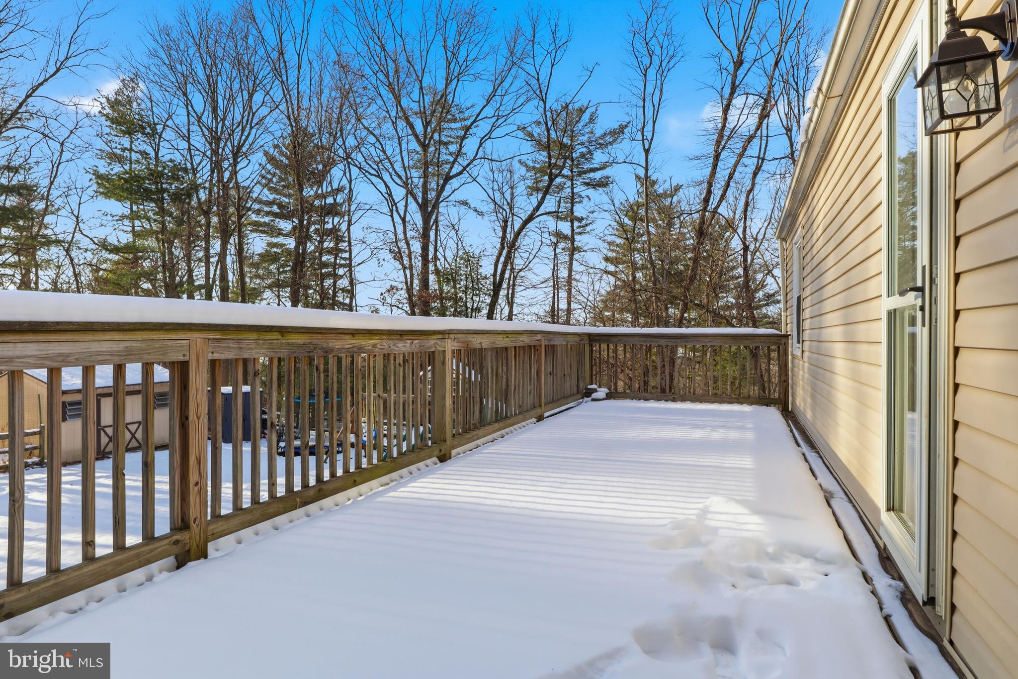 276 Oakbrook Drive Felton, PA 17322 - Photo 35 of 55 a view of balcony with wooden floor and fence