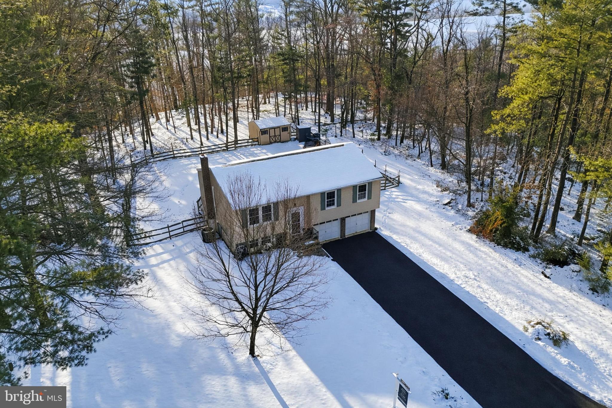 276 Oakbrook Drive Felton, PA 17322 - Photo 43 of 55 a view of a wooden deck and a backyard of the house