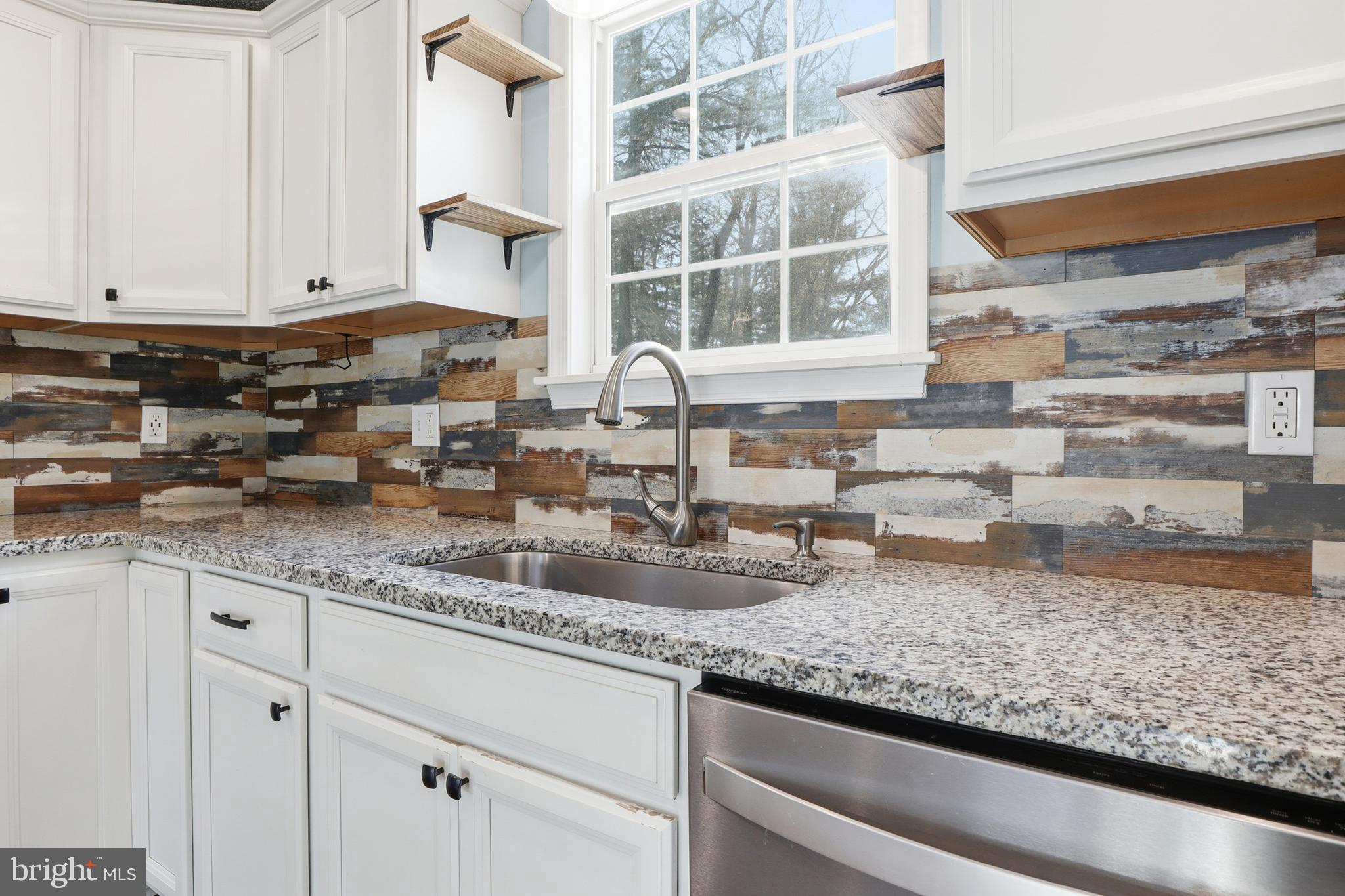 276 Oakbrook Drive Felton, PA 17322 - Photo 9 of 55 a kitchen with sink and cabinets