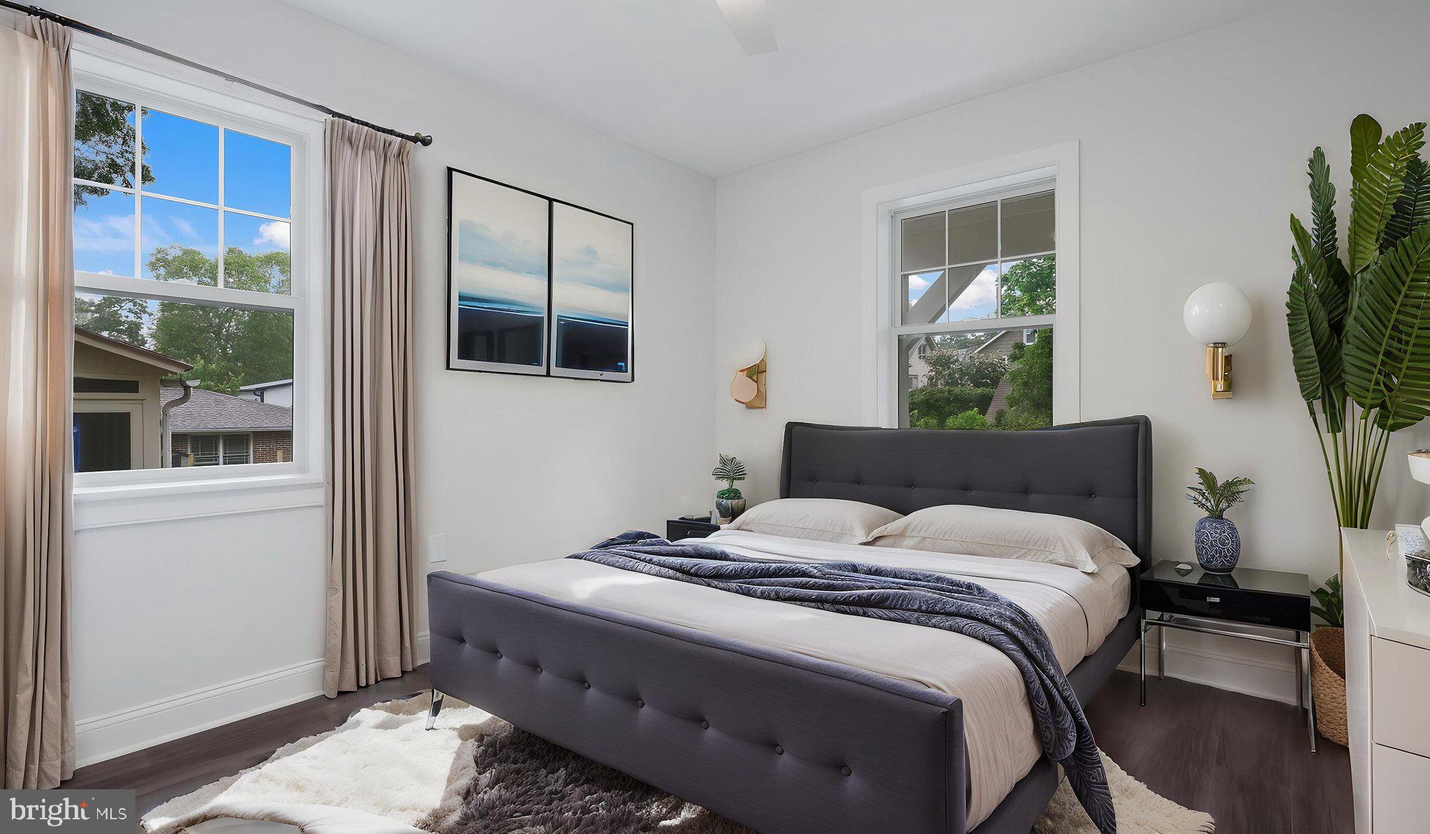 115 Harvey Avenue, Unit 1171 Doylestown, PA 18901 - Photo 20 of 26 a bedroom with a bed and a window