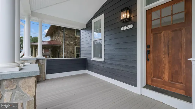 a view of livingroom with furniture and staircase