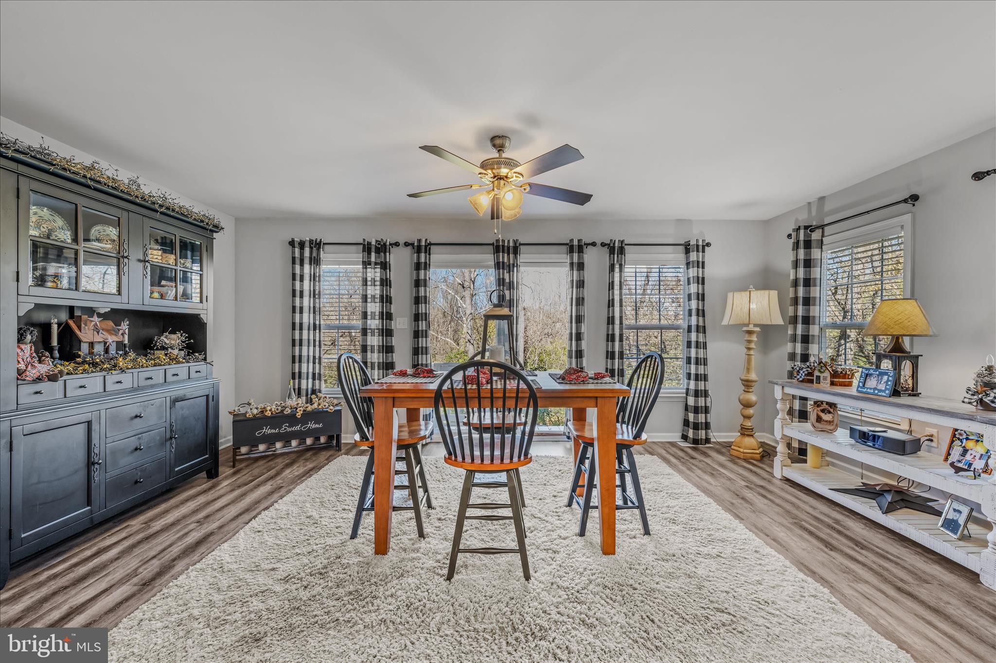 43 Scarboro Drive Bunker Hill, WV 25413 - Photo 14 of 43 a view of a dining room with furniture window and wooden floor