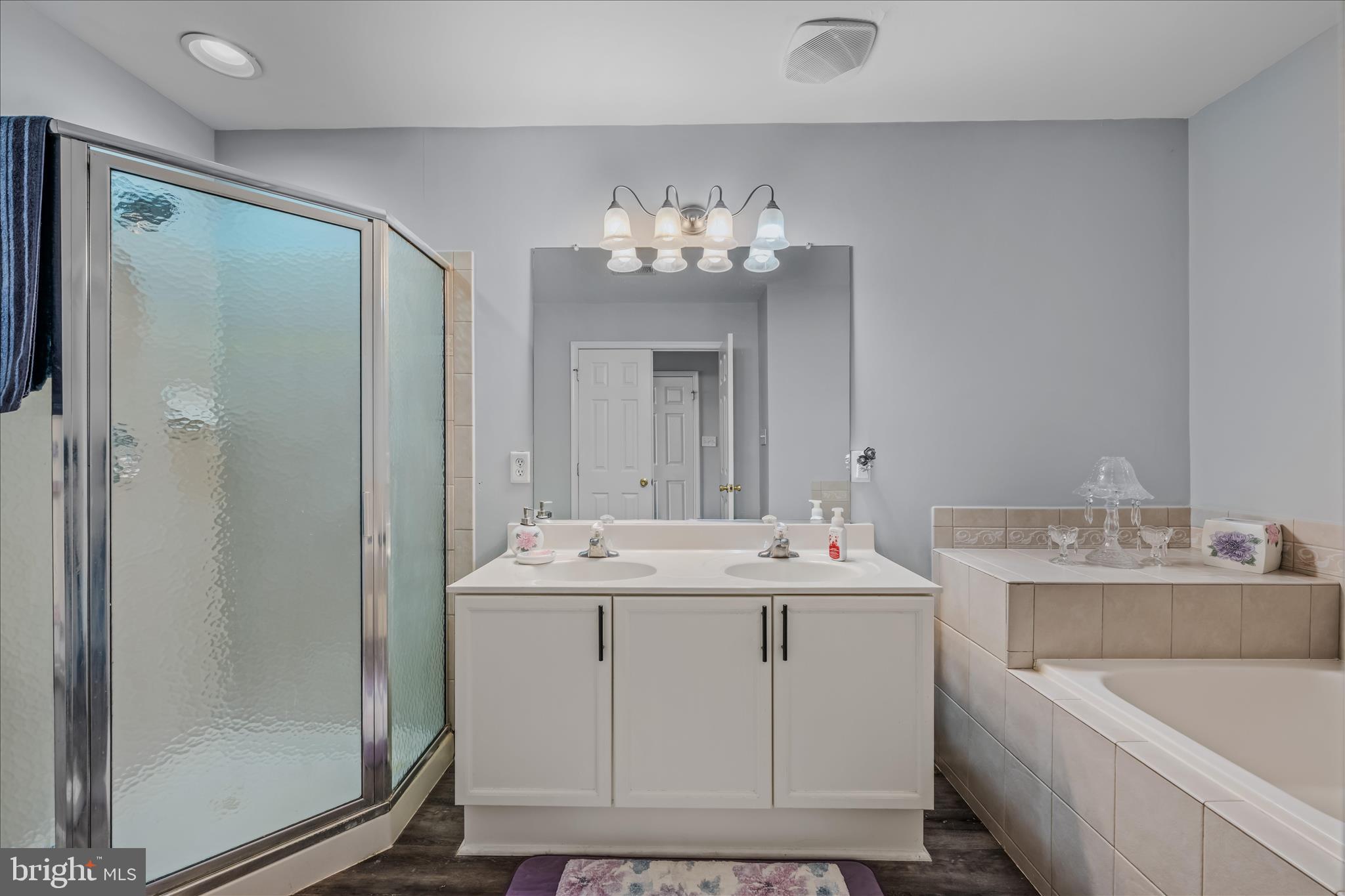 43 Scarboro Drive Bunker Hill, WV 25413 - Photo 20 of 43 a bathroom with a double vanity sink mirror and shower