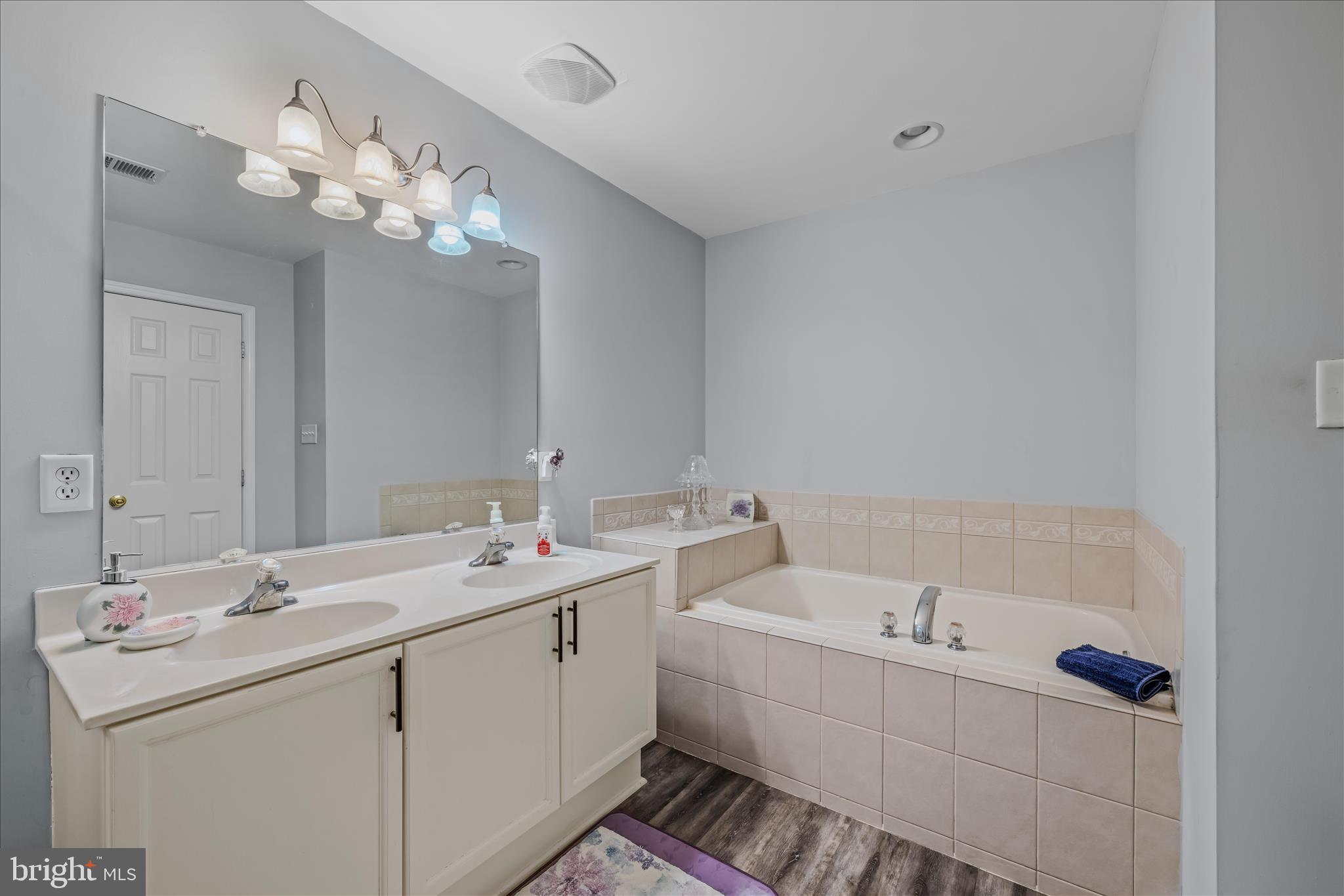 43 Scarboro Drive Bunker Hill, WV 25413 - Photo 21 of 43 a bathroom with a sink and a mirror