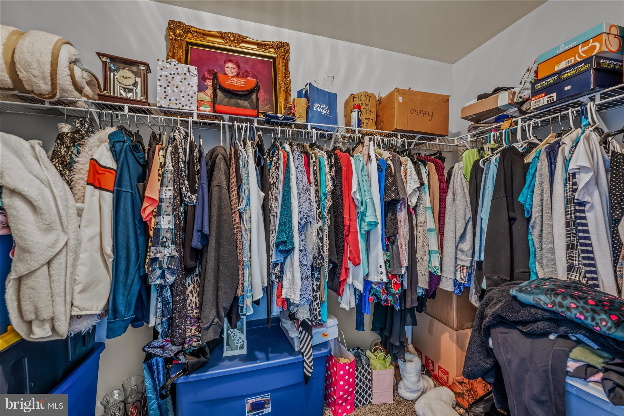 43 Scarboro Drive Bunker Hill, WV 25413 - Photo 22 of 43 a view of walk in closet with clothes
