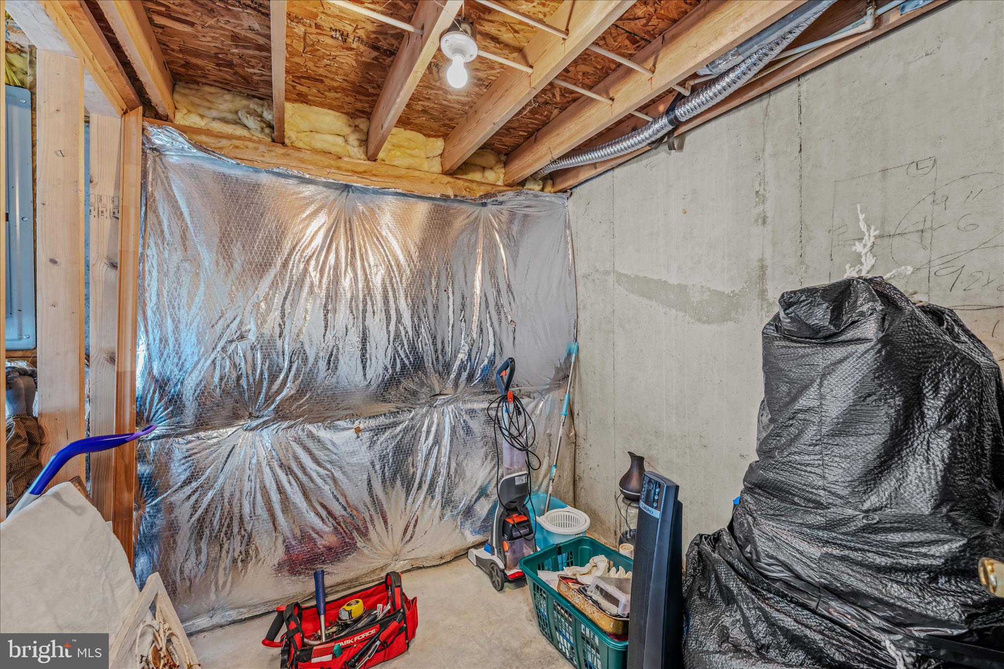 43 Scarboro Drive Bunker Hill, WV 25413 - Photo 31 of 43 a view of walk in closet with clothes