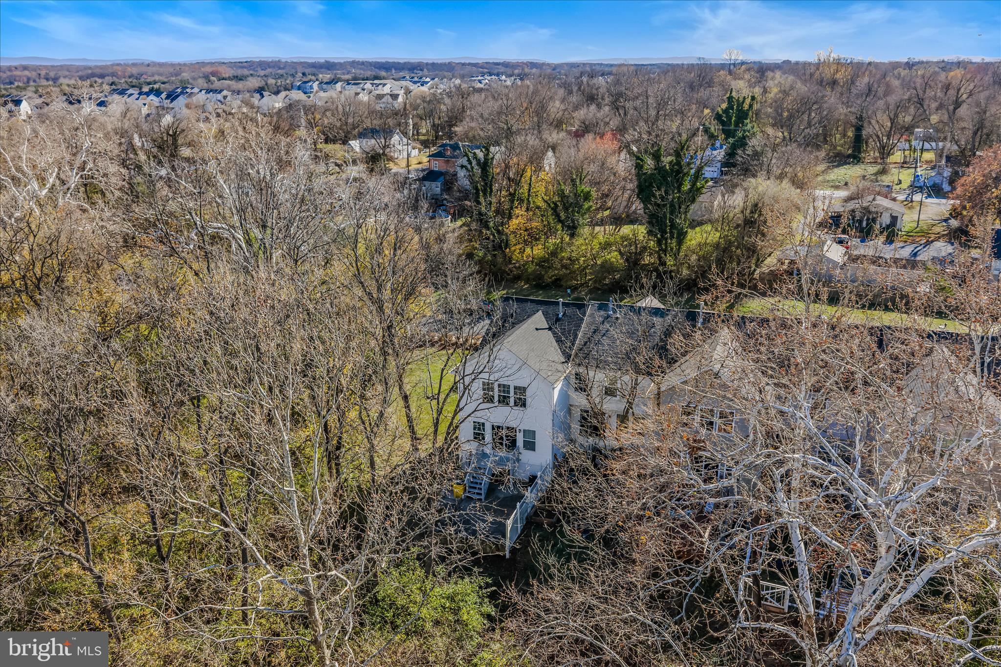 43 Scarboro Drive Bunker Hill, WV 25413 - Photo 37 of 43 a view of a city with lush green forest