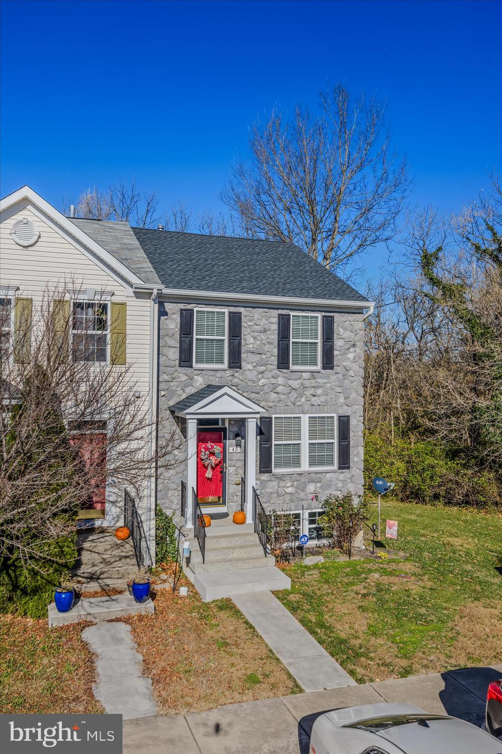 43 Scarboro Drive Bunker Hill, WV 25413 - Photo 4 of 43 a front view of a house with garden