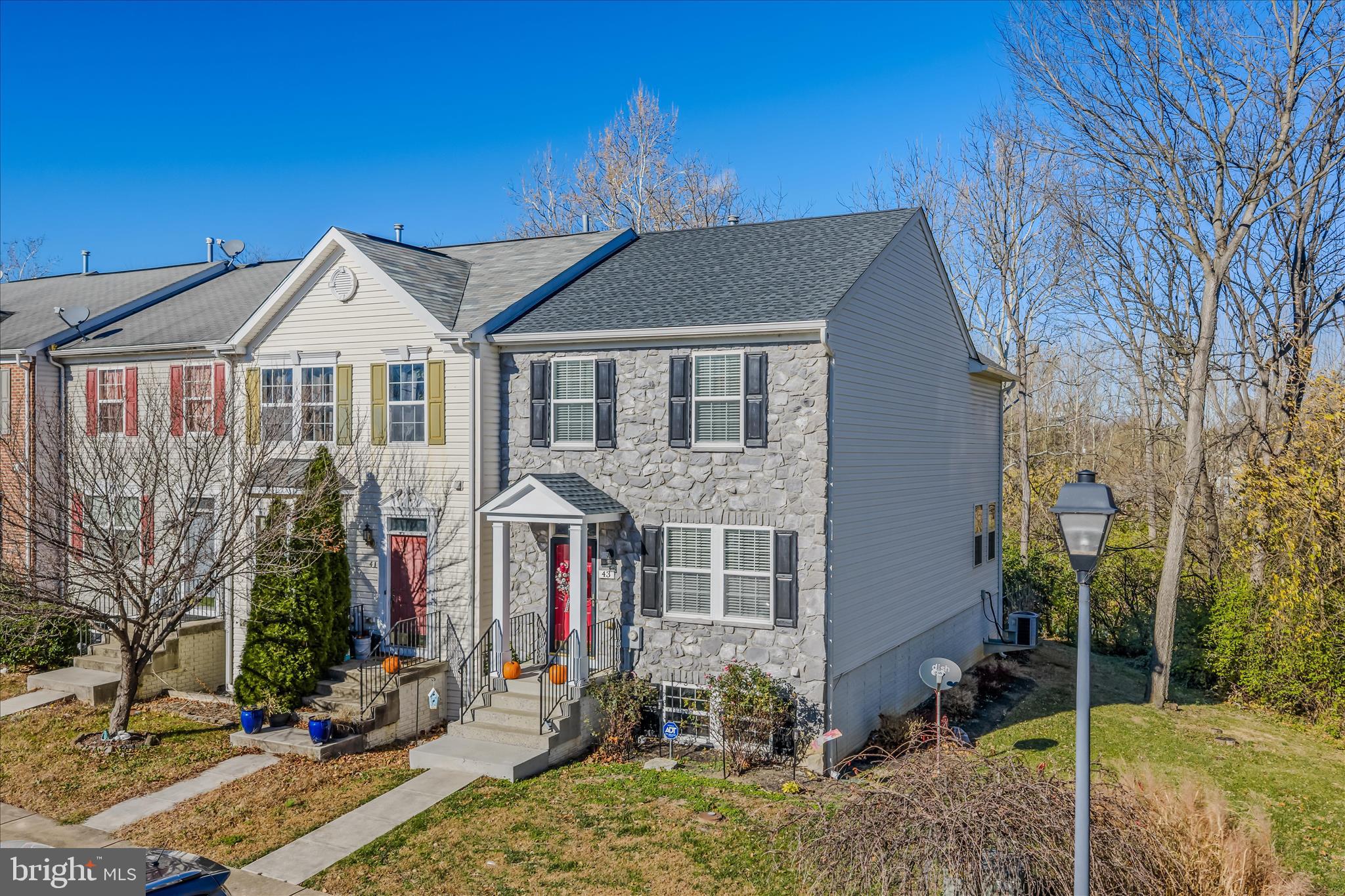 43 Scarboro Drive Bunker Hill, WV 25413 - Photo 5 of 43 a front view of a house with garden