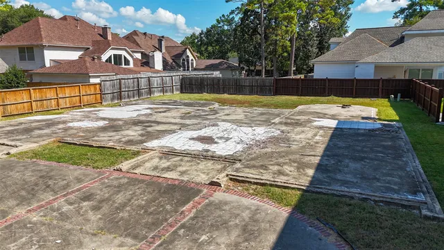 a view of swimming pool with a yard