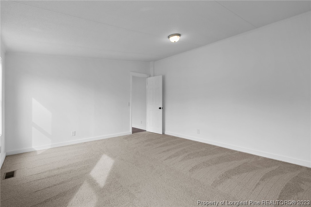420 Ridge Lane Autryville, NC 28318 - Photo 11 of 39 a view of an empty room