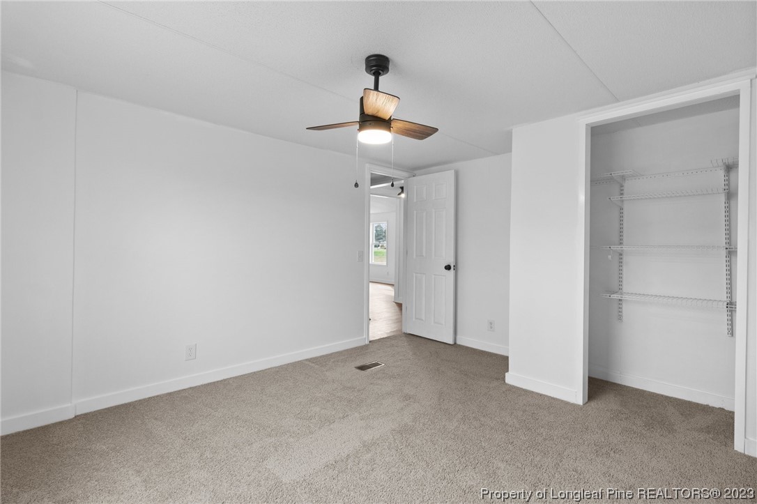 420 Ridge Lane Autryville, NC 28318 - Photo 27 of 39 a view of an empty room