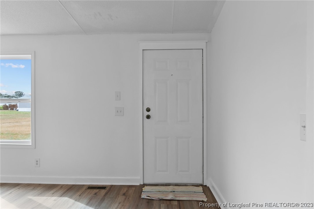 420 Ridge Lane Autryville, NC 28318 - Photo 7 of 39 a view of an empty room