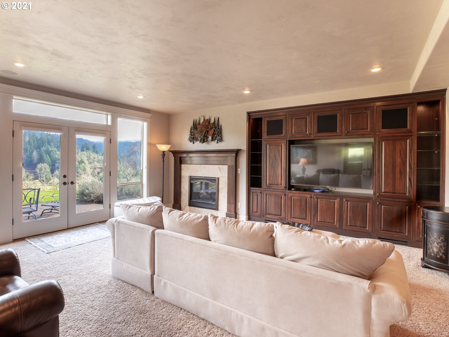 37001 Wallace Creek Road Springfield, OR 97478 - Photo 21 of 31 a living room with furniture and a flat screen tv