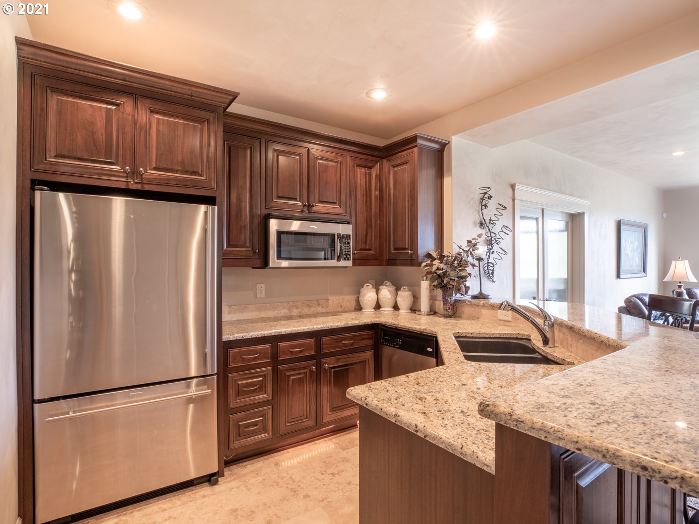 37001 Wallace Creek Road Springfield, OR 97478 - Photo 22 of 31 a kitchen with stainless steel appliances granite countertop a refrigerator sink and cabinets
