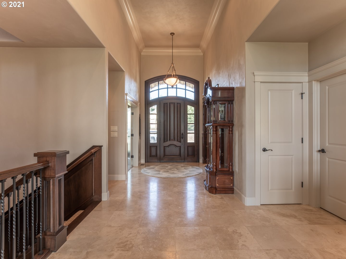 37001 Wallace Creek Road Springfield, OR 97478 - Photo 5 of 31 a view of a hallway with entryway windows and stairs