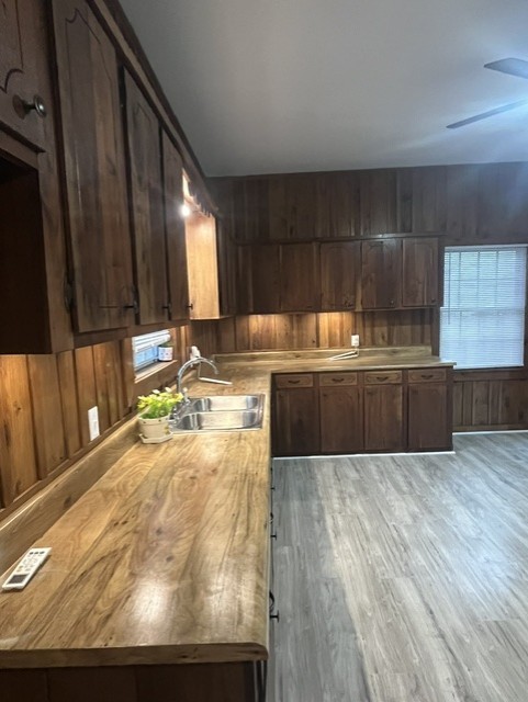 1386 Chisholm Road Cypress Inn, TN 38452 - Photo 54 of 58 a view of a kitchen with kitchen island a sink wooden floor and counter space