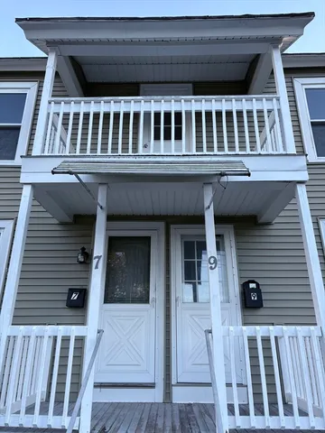 a front view of a house with balcony