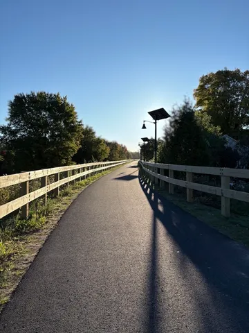 a view of a city street from a balcony