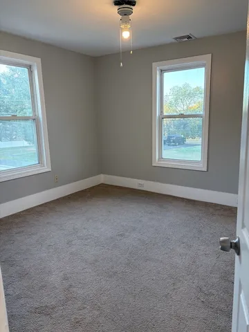 an empty room with a window