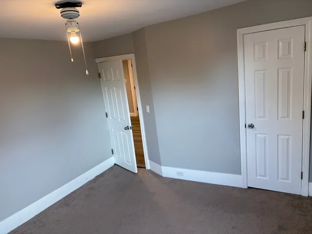 an empty room with a hallway