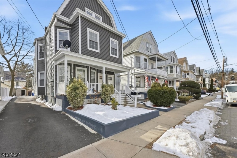 76 Riggs Place, Unit 2 West Orange, NJ 07052 - Photo 24 of 24 a view of a building with a yard