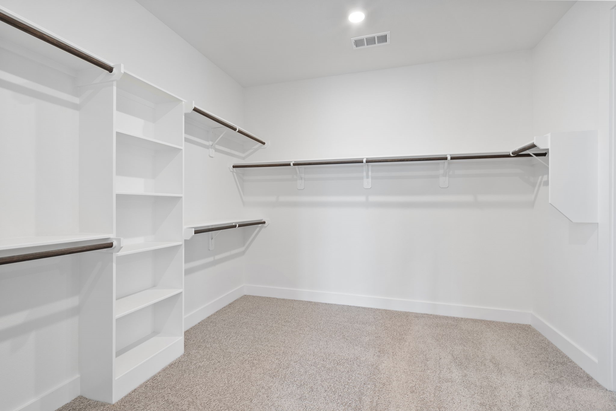 620 Cross Timbers Trace Waller, TX 77484 - Photo 27 of 36 a view of an empty walk in closet