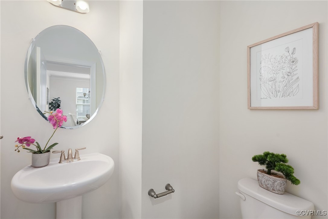 9019 Forge Gate Lane Chesterfield, VA 23832 - Photo 14 of 47 a bathroom with a sink mirror and vanity