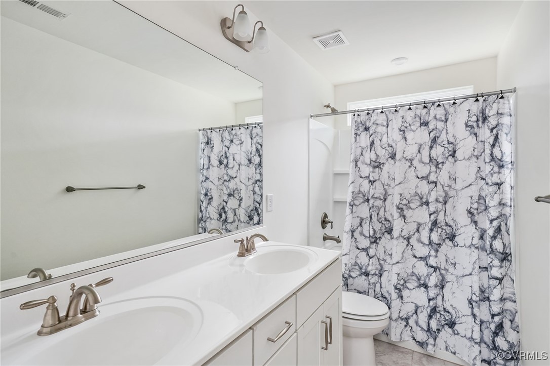 9019 Forge Gate Lane Chesterfield, VA 23832 - Photo 27 of 47 a bathroom with a sink toilet and shower
