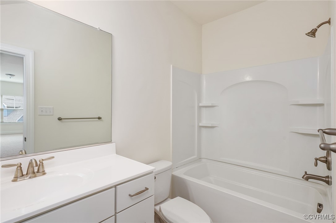 9019 Forge Gate Lane Chesterfield, VA 23832 - Photo 30 of 47 a bathroom with a sink toilet vanity and shower