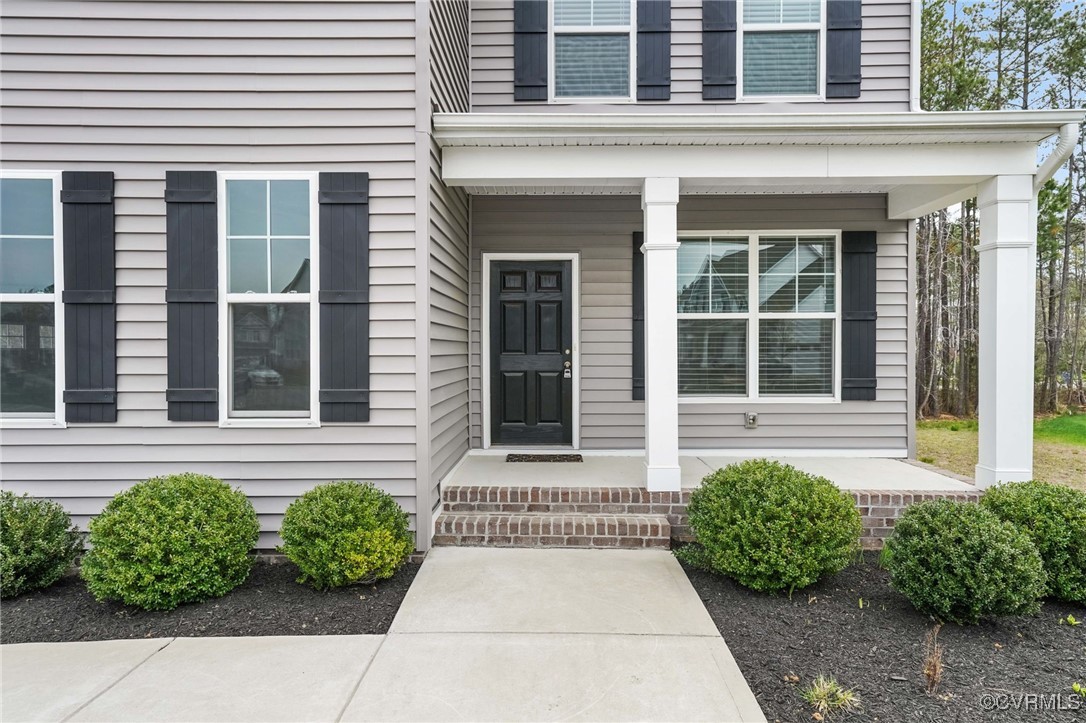 9019 Forge Gate Lane Chesterfield, VA 23832 - Photo 35 of 47 a front view of a house