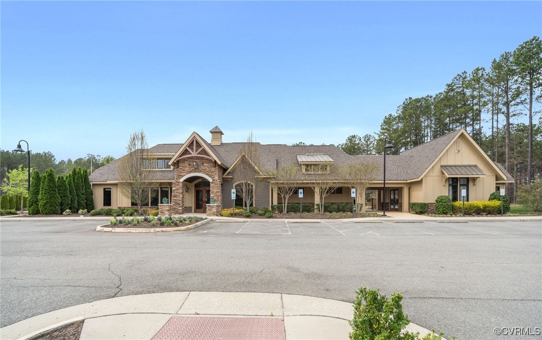 9019 Forge Gate Lane Chesterfield, VA 23832 - Photo 38 of 47 a front view of a house with a yard