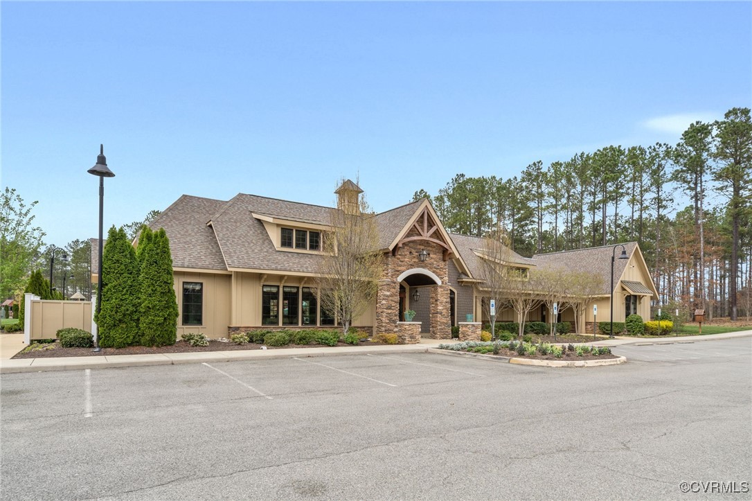 9019 Forge Gate Lane Chesterfield, VA 23832 - Photo 39 of 47 a front view of a house with a yard and garage