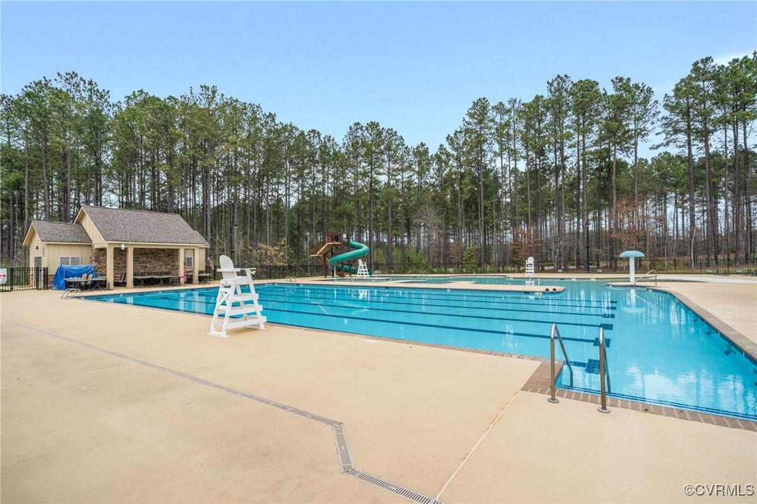 9019 Forge Gate Lane Chesterfield, VA 23832 - Photo 41 of 47 a view of a patio with a table and chairs