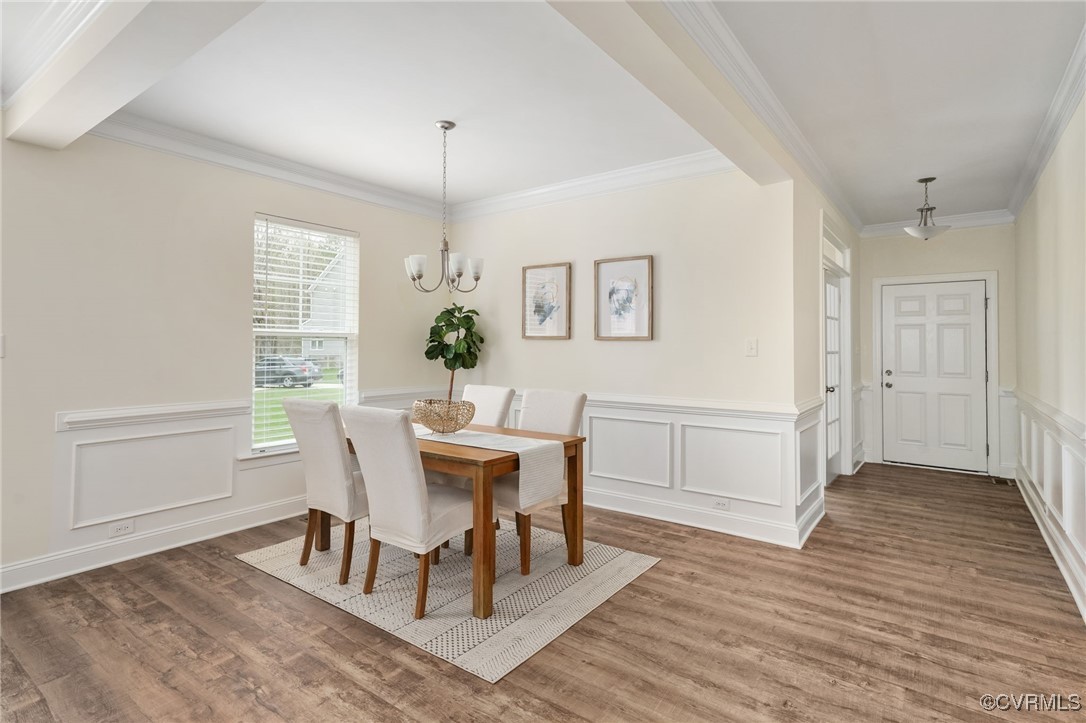 9019 Forge Gate Lane Chesterfield, VA 23832 - Photo 7 of 47 a view of a dining room with furniture window and wooden floor