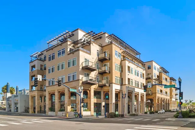 a view of a building with a street