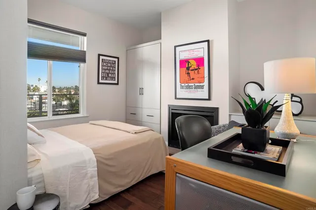 a bedroom with a bed and furniture