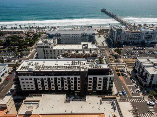 an aerial view of a house with garden