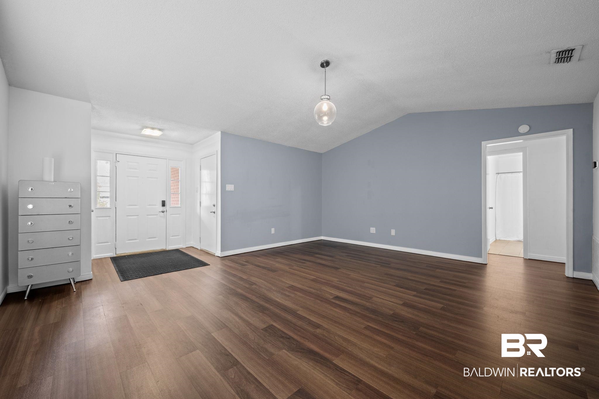 3716 Pepper Ridge Drive Mobile, AL 36693 - Photo 4 of 20 Foyer featuring lofted ceiling and dark hardwood / wood-style floors