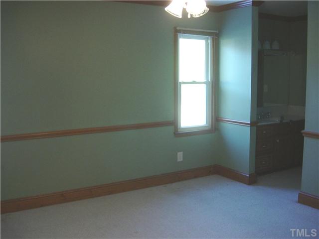 4603 West Lebanon Road Efland, NC 27243 - Photo 8 of 14 Large master suite with crown and chair rail molding plus 2 walk-in closets!