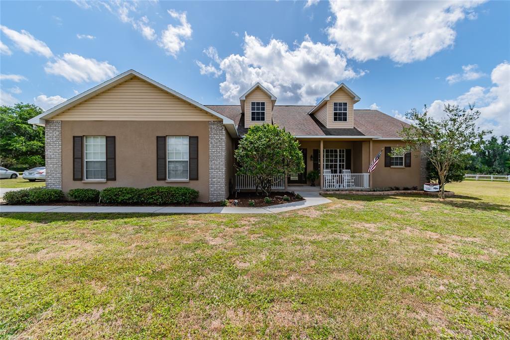 3412 North Forbes Road Plant City, FL 33565 - Photo 1 of 1 Peaceful Country Charm ~ Front Exposure Western