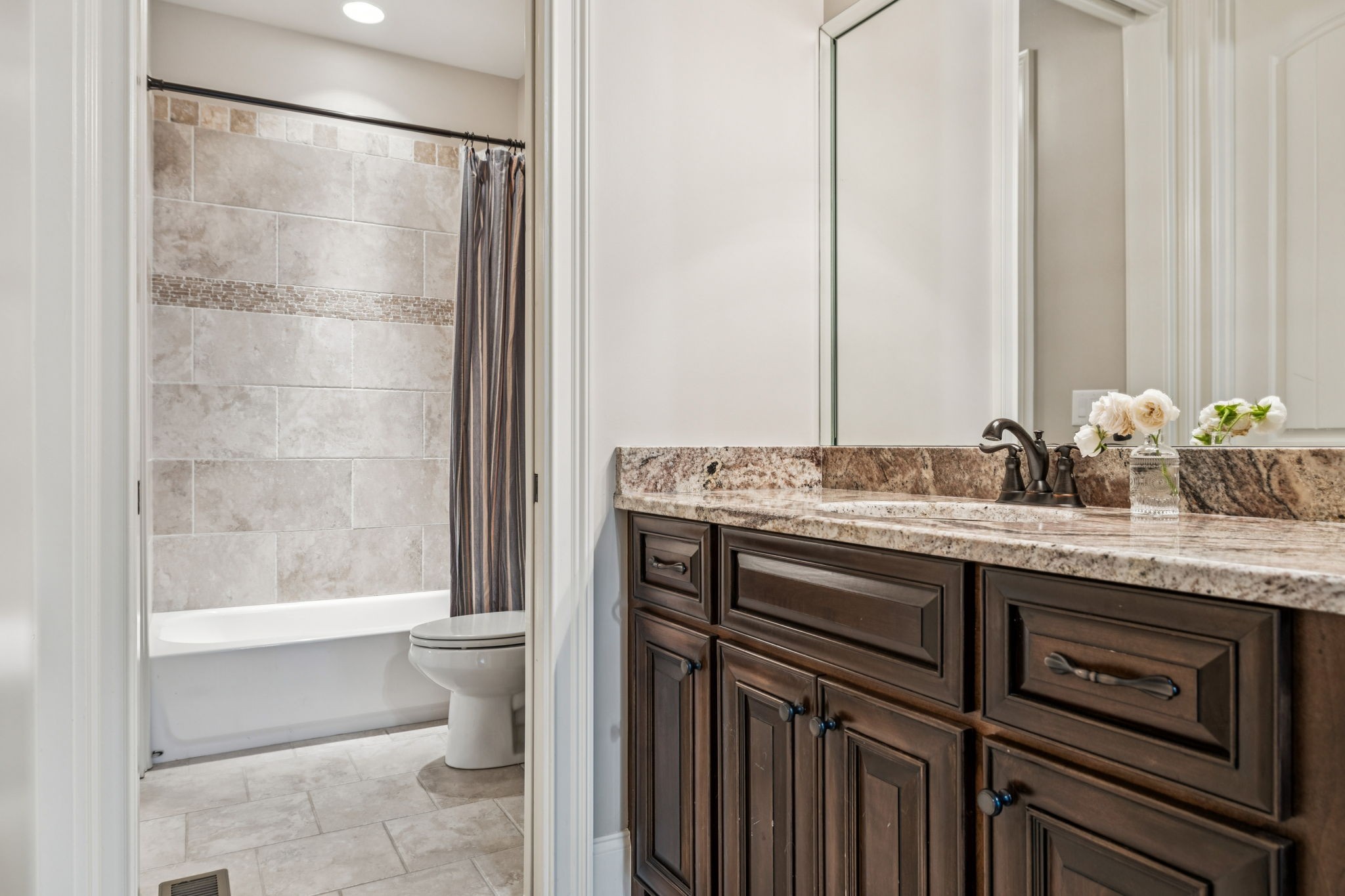 240 Laycrest Drive Mount Juliet, TN 37122 - Photo 16 of 100 a bathroom with a granite countertop sink a toilet and shower