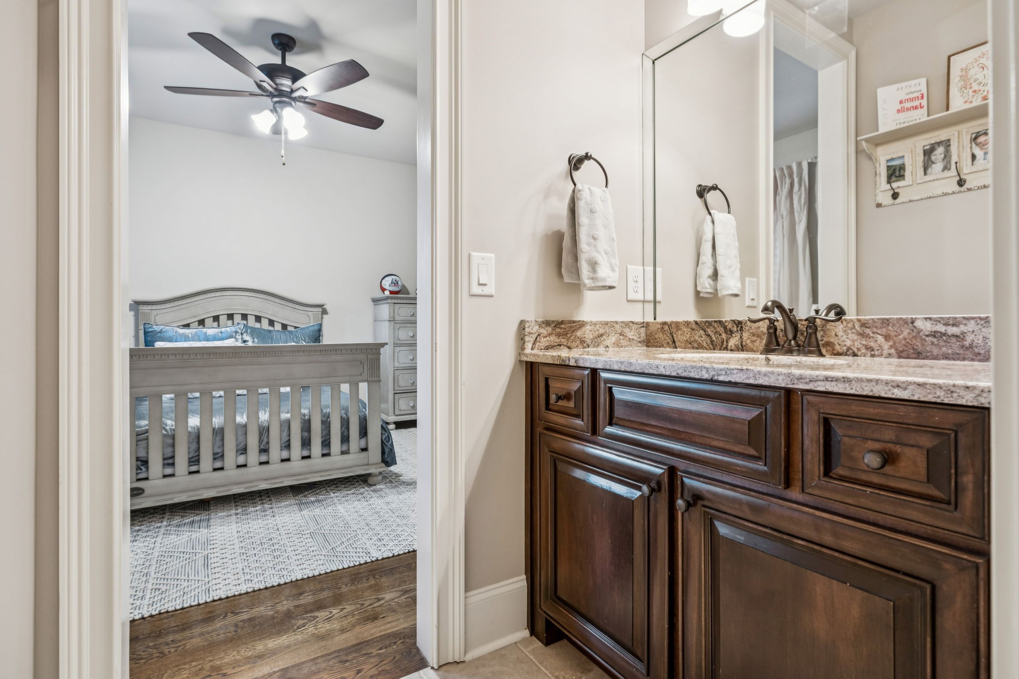 240 Laycrest Drive Mount Juliet, TN 37122 - Photo 18 of 100 a bathroom with a sink a mirror and a bathtub